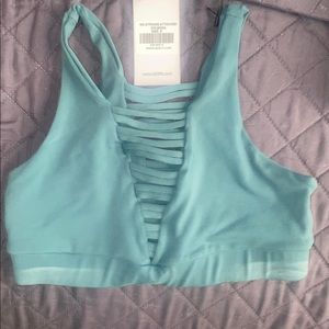 BRAND NEW WITH TAGS 925 fit sports bra in color basil. 
Size small